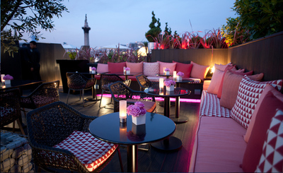 Terrace seating at Vista Rooftop Bar
